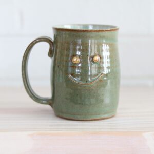 Green happy mug - cheerful expression