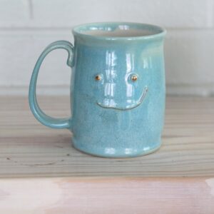 Turquoise face mug