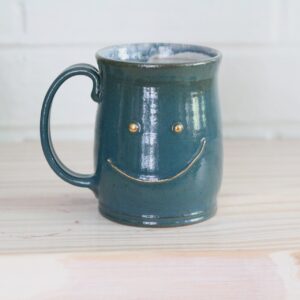 Teal face mug